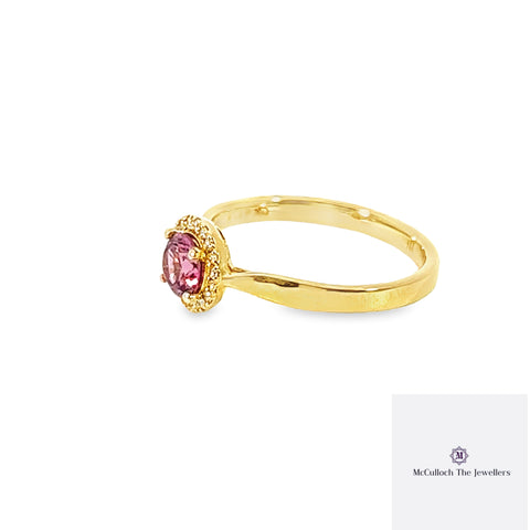 9CT PINK TOURMALINE HALO DIAMOND RING